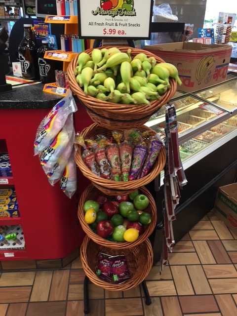 Always Fresh tiered basket display with signage