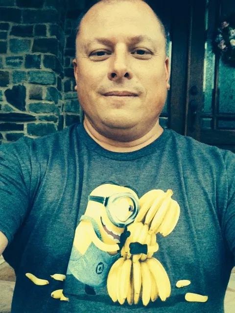 Team member wearing a banana-themed shirt